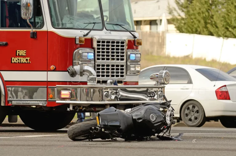 Motorcycle and fire truck collision